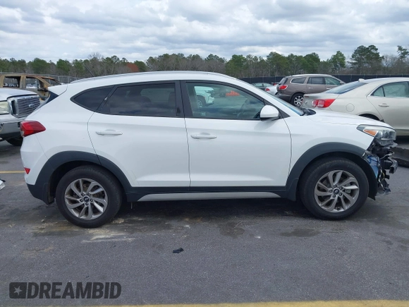 2017 Hyundai Tucson SE with VIN KM8J3CA44HU511581, listed as a IAAI auction lot 41687971 with 111,981 mi miles. Bid and sale history available at carsss.com. Image 14.