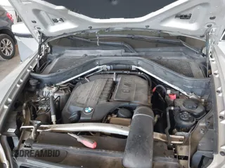 2013 BMW X5 xDrive35i z VIN 5UXZV4C55D0B09049, wystawiony jako IAAI lot #42193454 z przebiegiem 186 845 mil mil oraz . Historia ofert i sprzedaży dostępna na DreamBid. Obrazek 10.