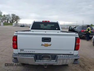 2016 Chevrolet Silverado 1500 LT with VIN 1GCVKREC7GZ338959, listed as a IAAI auction lot 42147778 with 140,570 mi miles and . Bid and sale history available at DreamBid. Image 16.
