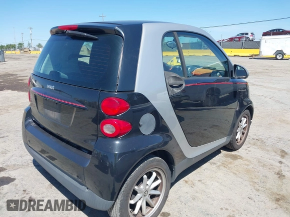 2008 Smart fortwo Pure with VIN WMEEJ31X78K180398, listed as a IAAI auction lot 42193886 with 98,136 mi miles and . Bid and sale history available at DreamBid. Image 4.