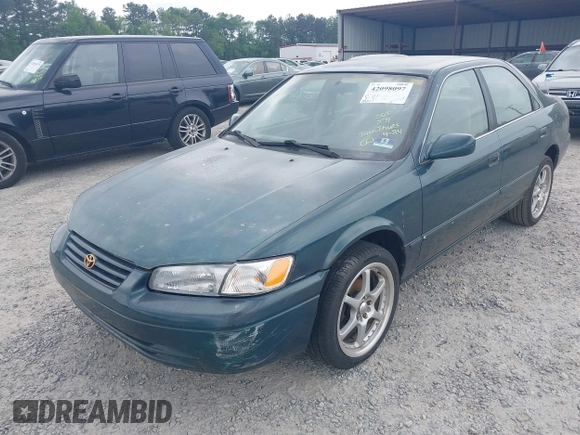 1997 Toyota Camry LE z VIN 4T1BG22K7VU005271, wystawiony jako IAAI lot #42098097 z przebiegiem Nie podano mil oraz . Historia ofert i sprzedaży dostępna na DreamBid. Obrazek 6.