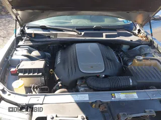 2006 Chrysler 300 C with VIN 2C3KA63HX6H518989, listed as a IAAI auction lot 41741341 with 134,636 mi miles. Bid and sale history available at carsss.com. Image 10.