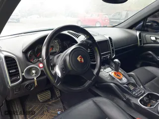 2012 Porsche Cayenne S Hybrid with VIN WP1AE2A2XCLA90082, listed as a IAAI auction lot 41960714 with 139,081 mi miles. Bid and sale history available at carsss.com. Image 20.