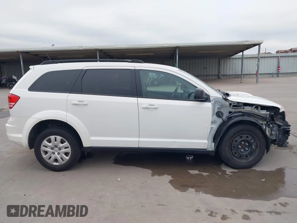 2020 Dodge Journey SE Value with VIN 3C4PDCAB4LT254595, listed as a IAAI auction lot 41572159 with 124,804 mi miles and . Bid and sale history available at carsss.com. Image 14.