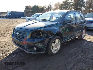 2008 Dodge Caliber SXT with VIN 1B3HB48BX8D658778, listed as a IAAI auction lot 41455439 with 165,874 mi miles. Bid and sale history available at carsss.com. Image 2.
