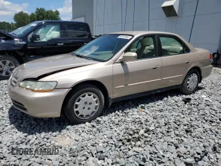 2002 Honda Accord LX z VIN 1HGCG56442A003742, wystawiony jako Copart lot #56949065 z przebiegiem 158 722 mil mil oraz Nie do naprawy • Non repairable. Historia ofert i sprzedaży dostępna na DreamBid. Obrazek 1.