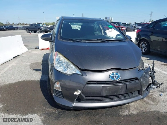 2014 Toyota Prius c One with VIN JTDKDTB37E1571685, listed as a IAAI auction lot 41967732 with 1 mi miles. Bid and sale history available at carsss.com. Image 11.