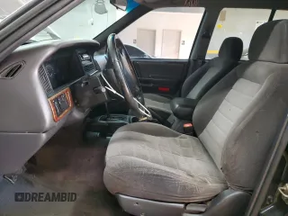 1996 Jeep Grand Cherokee Laredo with VIN 1J4GZ58S9TC370707, listed as a Copart auction lot 89285205 with 278,457 mi miles and Salvage Title. Bid and sale history available at carsss.com. Image 7.