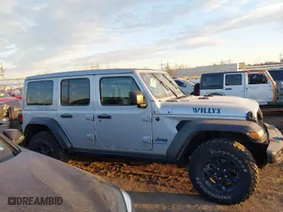2023 Jeep Wrangler 4xe with VIN 1C4JJXN65PW612855, listed as a IAAI auction lot 41285856 with 11,868 mi miles. Bid and sale history available at carsss.com. Image 13.