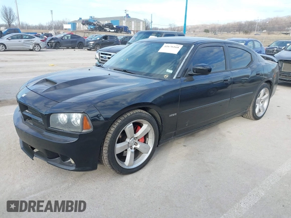 2006 Dodge Charger SRT-8 with VIN 2B3LA73W96H371246, listed as a IAAI auction lot 41676168 with 130,064 mi miles and . Bid and sale history available at carsss.com. Image 20.
