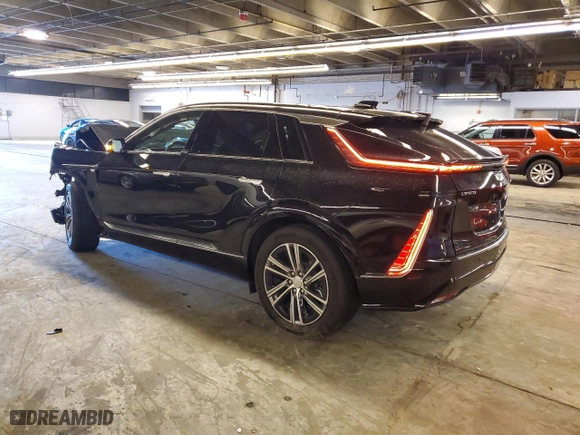 2023 Cadillac LYRIQ RWD Luxury with VIN 1GYKPMRKXPZ002144, listed as a Copart auction lot 49742274 with 0 mi miles and Salvage Title. Bid and sale history available at carsss.com. Image 2.