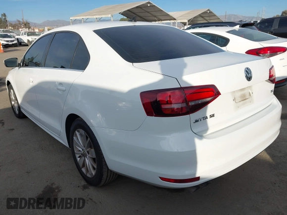 2016 Volkswagen Jetta Sedan 1.4T SE with VIN 3VWD67AJXGM365869, listed as a IAAI auction lot 41261109 with 59,325 mi miles. Bid and sale history available at carsss.com. Image 3.