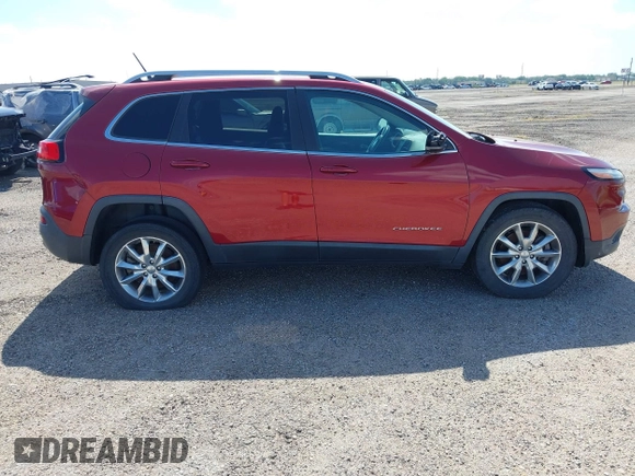 2014 Jeep Cherokee Limited with VIN 1C4PJMDB7EW165272, listed as a IAAI auction lot 35106260 with 102,934 mi miles and . Bid and sale history available at DreamBid. Image 13.