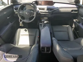 2021 Lexus UX 250h с VIN JTHP9JBHXM2045467, выставлен на аукционе Copart как лот 60781685 с пробегом 37 638 миль миль и Списание • Salvage title. История ставок и продаж доступна на DreamBid. Изображение 8.