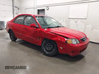 2003 Kia Spectra GS z VIN KNAFB161035115874, wystawiony jako IAAI lot #42179809 z przebiegiem 127 594 mil mil oraz . Historia ofert i sprzedaży dostępna na DreamBid. Obrazek 1.