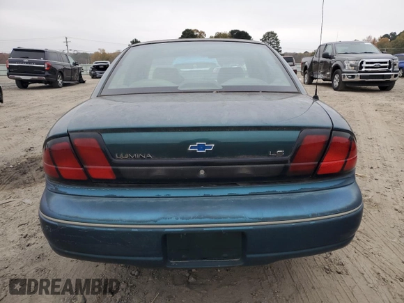 1997 Chevrolet Lumina LS with VIN 2G1WL52M3V9163567, listed as a Copart auction lot 82772324 with 191,852 mi miles and Salvage Title. Bid and sale history available at DreamBid. Image 6.