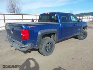 2014 Chevrolet Silverado 1500 LT with VIN 3GCUKREC1EG328016, listed as a IAAI auction lot 41880166 with 164,486 mi miles. Bid and sale history available at carsss.com. Image 4.