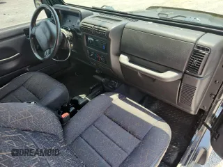 2001 Jeep Wrangler Sport с VIN 1J4FA49S91P347090, выставлен на аукционе Copart как лот 60436405 с пробегом 141 172 миль миль и Списание • Salvage title. История ставок и продаж доступна на DreamBid. Изображение 8.