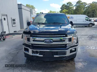 2019 Ford F-150 XL with VIN 1FTEW1E56KFA63764, listed as a IAAI auction lot 42410872 with 124,648 mi miles and . Bid and sale history available at DreamBid. Image 12.