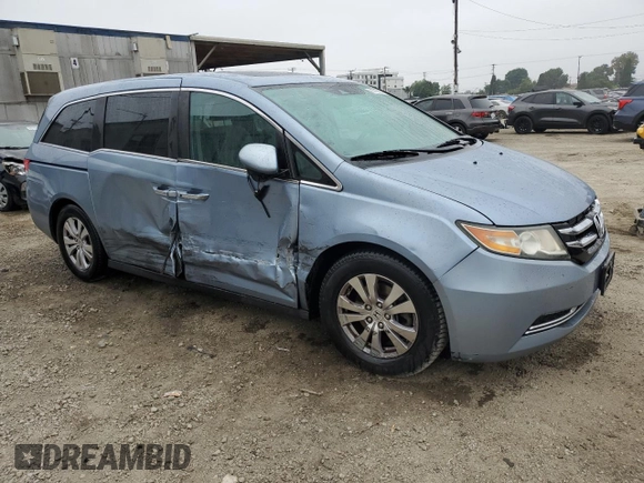 2014 Honda Odyssey EX-L with VIN 5FNRL5H68EB103941, listed as a Copart auction lot 60715095 with 109,013 mi miles and Salvage title. Bid and sale history available at DreamBid. Image 4.