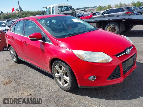 2012 Ford Focus SEL with VIN 1FAHP3H23CL291253, listed as a IAAI auction lot 42044902 with 184,716 mi miles. Bid and sale history available at carsss.com. Image 1.