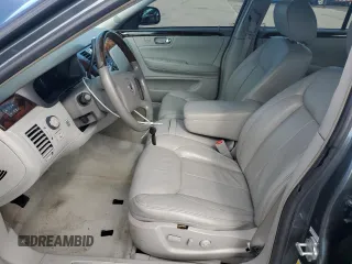 2010 Cadillac DTS w/1SC with VIN 1G6KD5EY6AU133836, listed as a Copart auction lot 46990655 with 112,195 mi miles and Salvage Title. Bid and sale history available at carsss.com. Image 7.