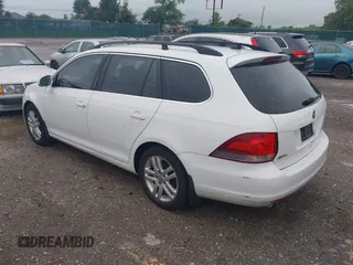 2014 Volkswagen Jetta TDI w/Sunroof & Nav with VIN 3VWPL7AJ1EM610321, listed as a IAAI auction lot 42701127 with 113,694 mi miles and . Bid and sale history available at DreamBid. Image 3.