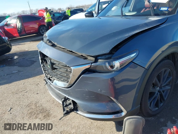 2022 Mazda CX-9 Grand Touring with VIN JM3TCBDYXN0625567, listed as a IAAI auction lot 41327380 with 50,672 mi miles and . Bid and sale history available at DreamBid. Image 6.