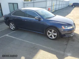 2014 Volkswagen Passat SE with VIN 1VWBP7A34EC008658, listed as a Copart auction lot 53994485 with 99,897 mi miles and Salvage Title. Bid and sale history available at carsss.com. Image 4.