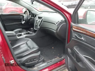 2012 Cadillac SRX Performance Collection with VIN 3GYFNEE36CS555764, listed as a IAAI auction lot 41813873 with 162,680 mi miles. Bid and sale history available at carsss.com. Image 5.