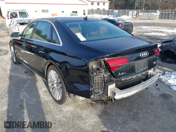 2015 Audi A8 L 4.0T with VIN WAU32AFD0FN035282, listed as a IAAI auction lot 41515136 with 76,518 mi miles. Bid and sale history available at carsss.com. Image 3.