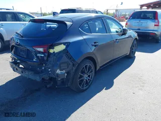 2014 Mazda Mazda3 s Grand Touring with VIN JM1BM1M32E1208762, listed as a IAAI auction lot 41814130 with 117,620 mi miles. Bid and sale history available at carsss.com. Image 4.