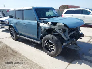 2023 Ford Bronco with VIN 1FMEE5DP0PLC07598, listed as a IAAI auction lot 41800965 with 14,392 mi miles and . Bid and sale history available at DreamBid. Image 1.