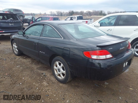 1999 Toyota Solara SE with VIN 2T1CF22P2XC252320, listed as a IAAI auction lot 41676843 with 156,431 mi miles. Bid and sale history available at carsss.com. Image 3.