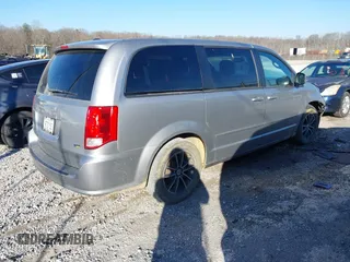 2016 Dodge Grand Caravan SE with VIN 2C4RDGBGXGR217926, listed as a IAAI auction lot 41631102 with 89,027 mi miles and . Bid and sale history available at DreamBid. Image 4.