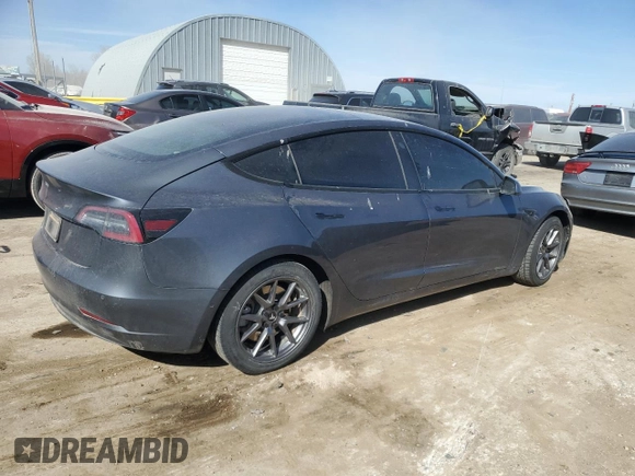 2021 Tesla Model 3 Standard Range Plus z VIN 5YJ3E1EA0MF089307, wystawiony jako Copart lot #50575465 z przebiegiem 131 251 mil mil oraz Szkody całkowita. Historia ofert i sprzedaży dostępna na DreamBid. Obrazek 3.