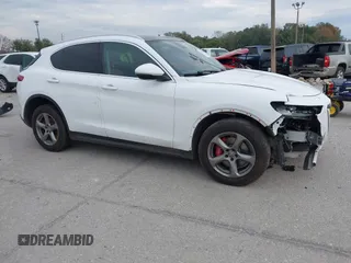 2018 Alfa Romeo Stelvio z VIN ZASFAKAN9J7B73870, wystawiony jako IAAI lot #41341576 z przebiegiem 100 041 mil mil oraz . Historia ofert i sprzedaży dostępna na DreamBid. Obrazek 1.