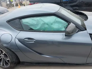2021 Toyota Supra 2.0 with VIN WZ1DB2C0XMW038679, listed as a IAAI auction lot 42407988 with 76,316 mi miles and . Bid and sale history available at DreamBid. Image 14.