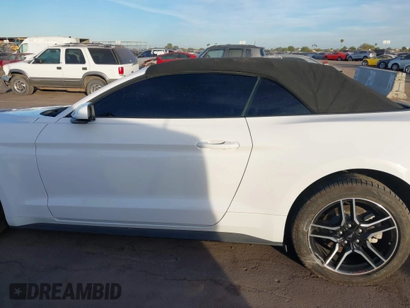 2021 Ford Mustang EcoBoost with VIN 1FATP8UH2M5120338, listed as a IAAI auction lot 40958016 with 76,979 mi miles. Bid and sale history available at carsss.com. Image 13.