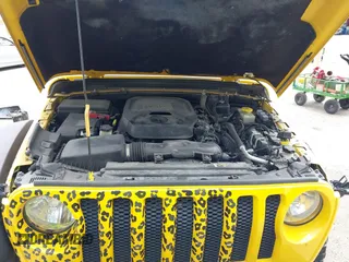 2018 Jeep Wrangler Unlimited Sport z VIN 1C4HJXDN2JW324872, wystawiony jako IAAI lot #42112231 z przebiegiem 80 412 mil mil oraz . Historia ofert i sprzedaży dostępna na DreamBid. Obrazek 10.