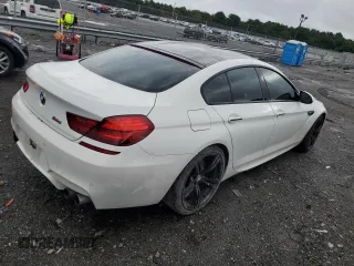 2015 BMW M6 z VIN WBS6C9C56FD467625, wystawiony jako Copart lot #64269363 z przebiegiem 92 698 mil mil oraz Nie do naprawy. Historia ofert i sprzedaży dostępna na DreamBid. Obrazek 3.