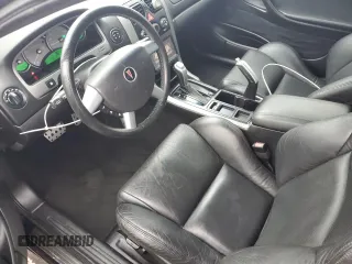 2005 Pontiac GTO z VIN 6G2VX12U15L381992, wystawiony jako Copart lot #74657644 z przebiegiem 21 995 mil mil oraz Szkody całkowita. Historia ofert i sprzedaży dostępna na DreamBid. Obrazek 7.