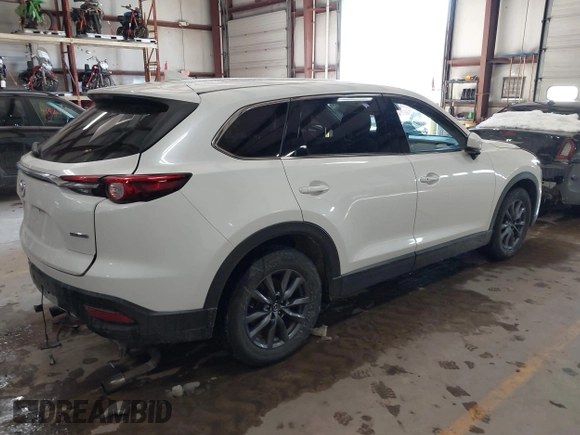 2020 Mazda CX-9 Touring z VIN JM3TCBCY8L0405360, wystawiony jako IAAI lot #41419428 z przebiegiem 69 917 mil mil oraz . Historia ofert i sprzedaży dostępna na DreamBid. Obrazek 4.