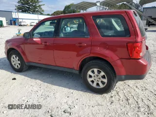 2011 Mazda Tribute Touring with VIN 4F2CY0C7XBKM00671, listed as a Copart auction lot 75431144 with 140,748 mi miles and Clean Title. Bid and sale history available at carsss.com. Image 2.