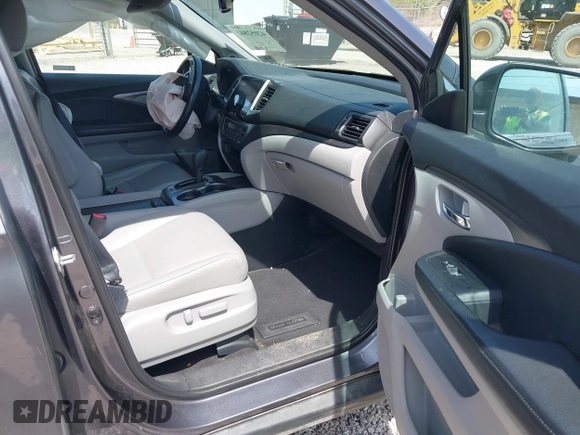 2018 Honda Pilot EX-L with VIN 5FNYF6H52JB066721, listed as a IAAI auction lot 42052842 with 134,393 mi miles and . Bid and sale history available at DreamBid. Image 5.