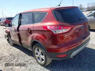 2015 Ford Escape SE with VIN 1FMCU0G71FUC87446, listed as a IAAI auction lot 41814589 with 137,051 mi miles. Bid and sale history available at carsss.com. Image 3.