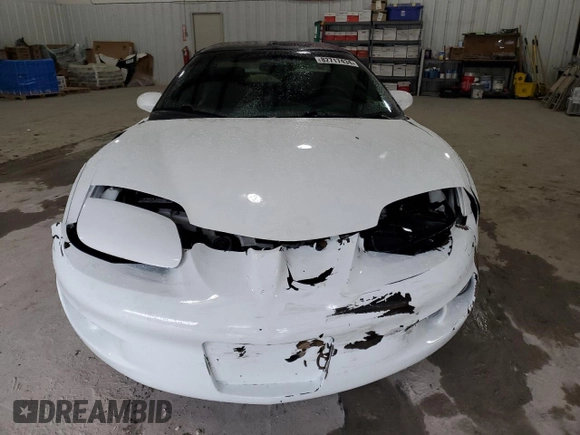 1998 Pontiac Firebird Firebird z VIN 2G2FS22KXW2207621, wystawiony jako Copart lot #82717434 z przebiegiem 63 973 mil mil oraz Szkoda całkowita • Salvage title. Historia ofert i sprzedaży dostępna na DreamBid. Obrazek 5.