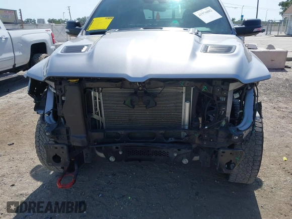 2022 Ram 1500 Rebel z VIN 1C6SRFLT2NN351050, wystawiony jako IAAI lot #41976882 z przebiegiem 59 490 mil mil oraz . Historia ofert i sprzedaży dostępna na DreamBid. Obrazek 6.