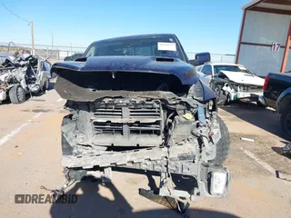 2014 Ram 1500 Sport z VIN 1C6RR6MT3ES366719, wystawiony jako IAAI lot #42228139 z przebiegiem Nie podano mil oraz . Historia ofert i sprzedaży dostępna na DreamBid. Obrazek 12.