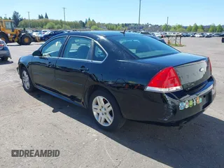 2014 Chevrolet Impala LT with VIN 2G1WB5E30E1166401, listed as a IAAI auction lot 42071504 with 158,813 mi miles and . Bid and sale history available at DreamBid. Image 3.